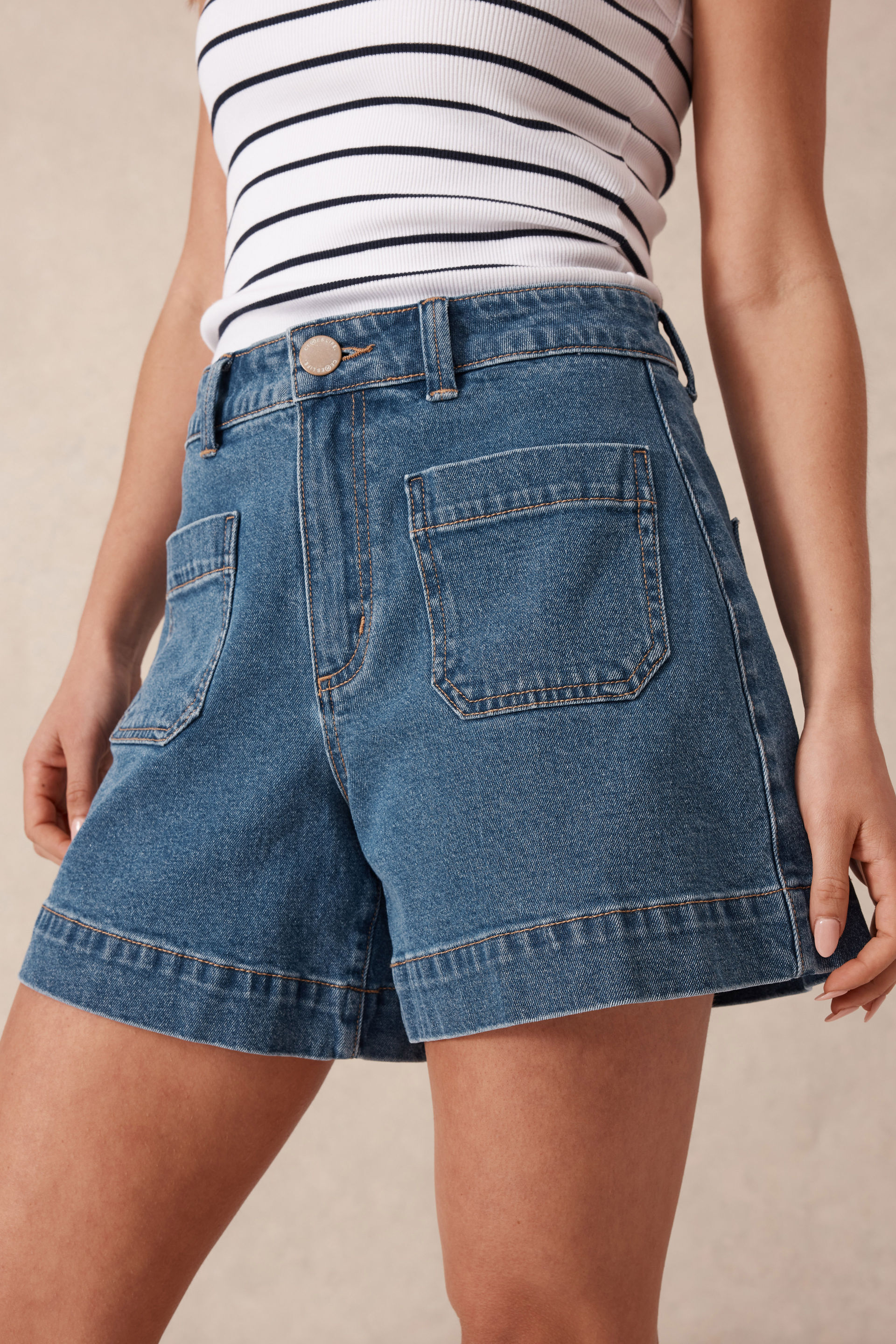 Denim shorts pockets showing clearance