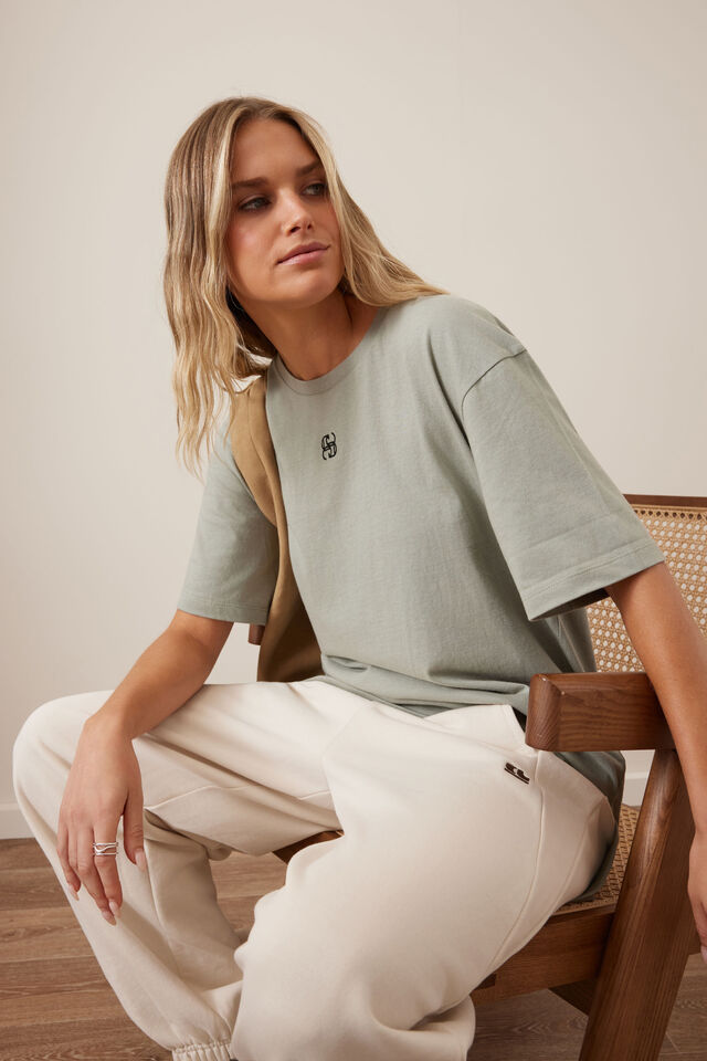 Lola Longline Step Hem Tee, SOFT SAGE/ PHANTOM CERES MONOGRAM EMBROIDERY