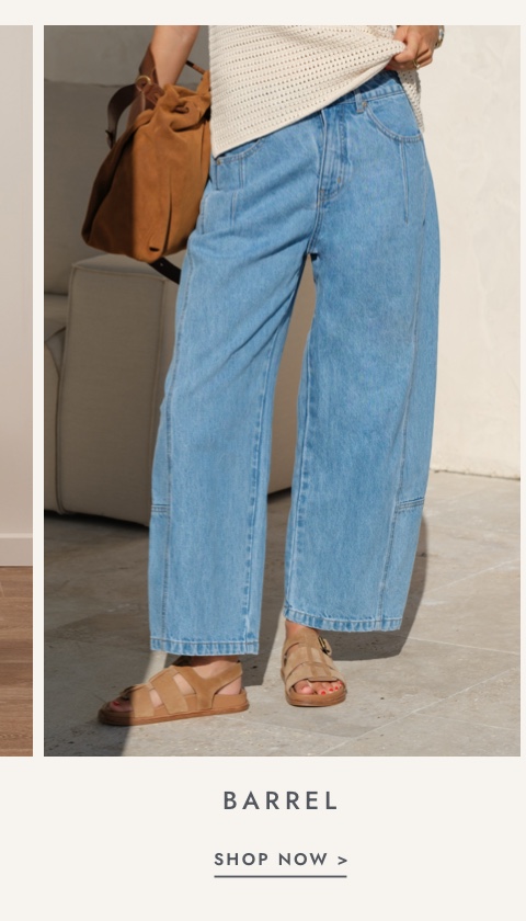 Shop barrel leg jeans. Click to shop.