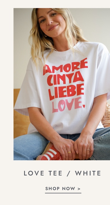 Shop white love tee. Click to shop.